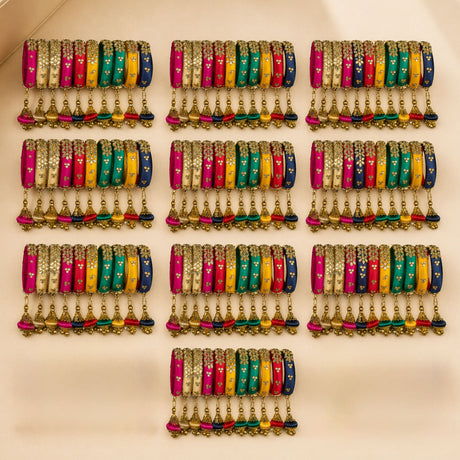 Colorful silk thread bangles with gold floral detailing and dangling tassels ethnic handmade for indian wedding