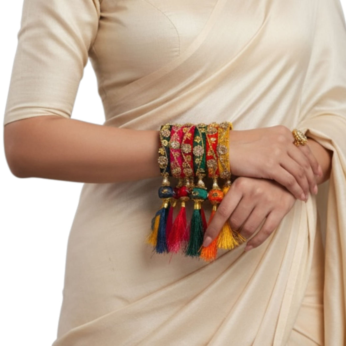 A set of five vibrant silk thread bangles with kundan-style embroidery and multicolor tassels for weddings and festivals