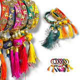 Silk thread bangles for women in vibrant orange pink and yellow with kundan work and gold tassel embellishments