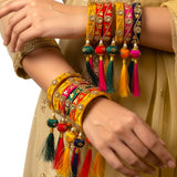 Silk thread bangles for women in red yellow and pink with kundan work and latkan for weddings and festivals