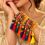 Silk thread bangles set for women featuring vibrant multi colors intricate gold embroidery kundan work and matching tassels