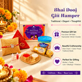 Golden heart-shaped tray holding red and white powders included in pure silver bhai dooj gift hamper for brother