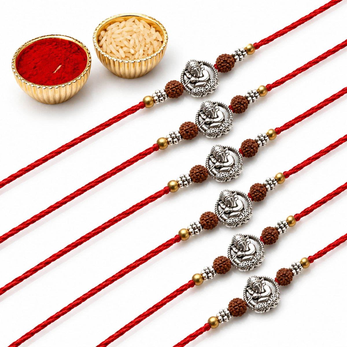 Designer silver tone Ganesha rakhi with red cord and brown beads for brother and bhabhi on Raksha Bandhan