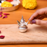 Silver plated mini mangal kalash 2 inch with silver lotus shaped diya and intricate leaf detailing for pooja decor