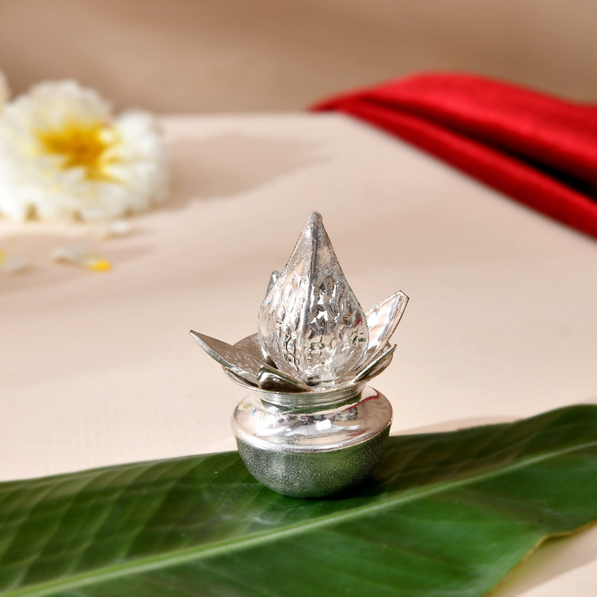 Silver plated mini mangal kalash incense burner with lotus shape intricate hammered detailing for pooja decor
