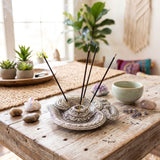 Silver-toned aluminum om incense holder with intricate mandala and elephant design for mess-free temple decor