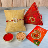 Designer pure silver om rakhi with red and gold beads for Raksha Bandhan comes with brocade box and roli chawal