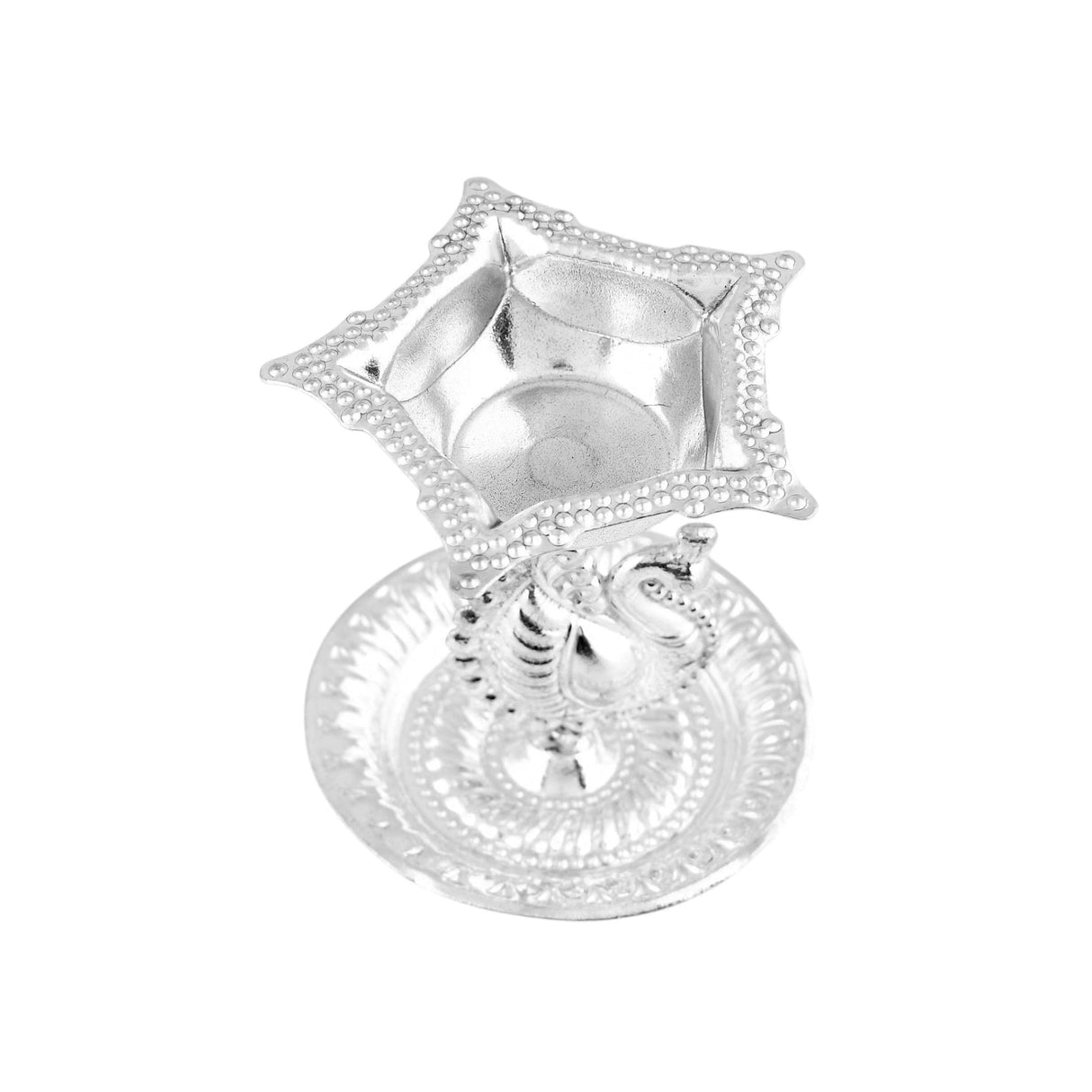 Silver plated star-shaped diya with intricate bead detailing and decorative peacock base for home pooja mandir