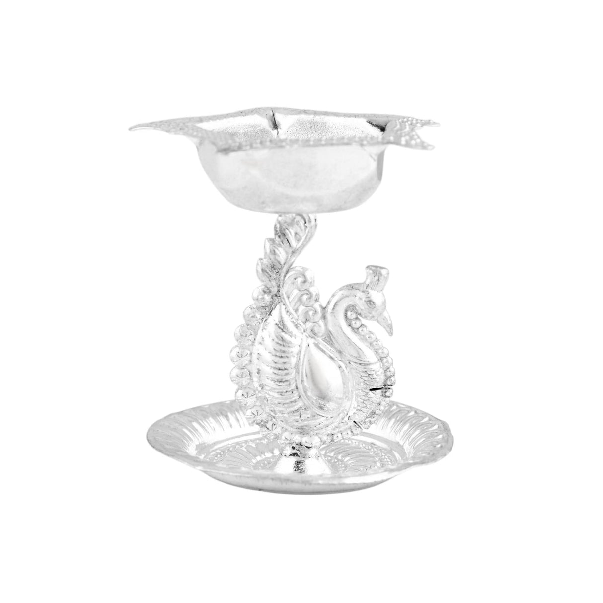 Silver plated peacock diya oil lamp with intricate detailing and reflective finish for home pooja mandir and Diwali decor