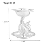 Silver plated peacock diya oil lamp with intricate detailing and reflective finish for home pooja mandir and diwali decor