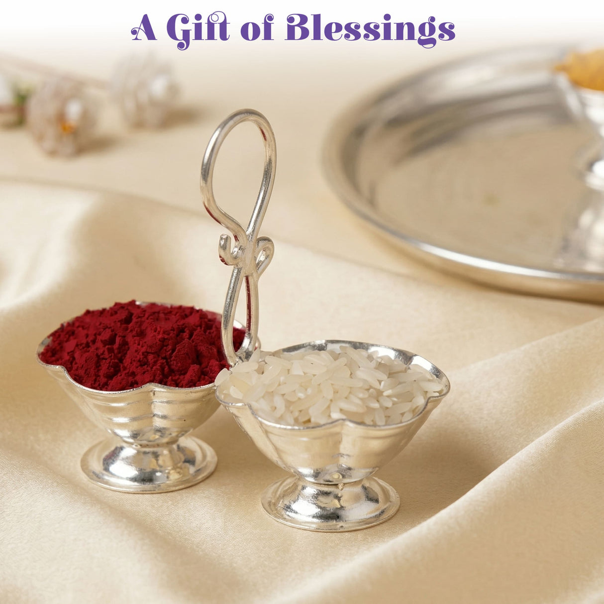 Silver plated haldi kumkum holder with two scalloped pedestal bowls connected by an ornate handle for puja use