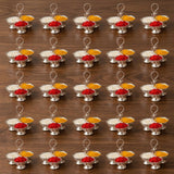 Silver plated haldi kumkum holder with red and yellow powder compartments for home temple and festive puja use