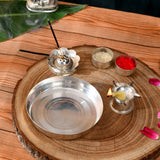 Silver plated incense burner with petal-shaped design and two black sticks in 5-piece pooja thali set for rituals