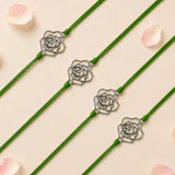 Green cord bracelet with a delicate silver toned rose charm rose charm rakhi for brother and bhabhi protection gift