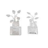 Silver plated tulsi plant figurines with delicate wire stems and leaf cutouts in clear glass pots for home pooja decor