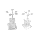 Silver plated miniature tulsi plant figurines with twisted stems and engraved square bases for home pooja mandir decor