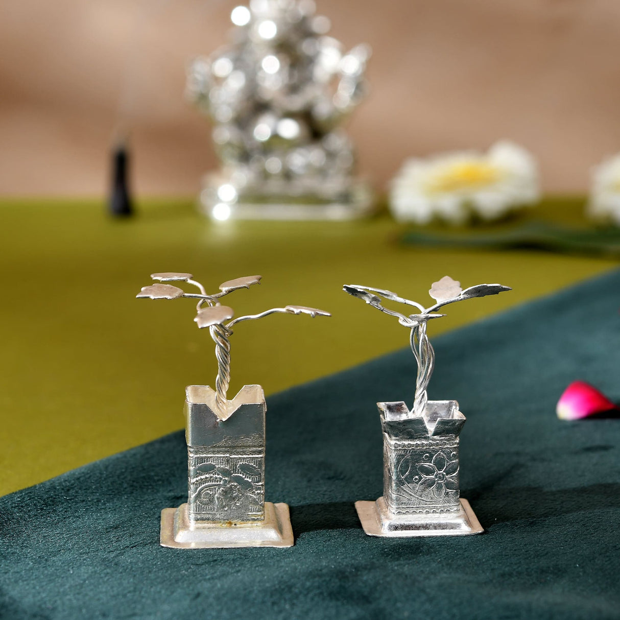 Silver plated tulsi plant with intricate floral engravings and twisted stems for pooja mandir decor and spiritual gifts