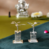 Silver plated tulsi plant with intricate floral engravings and twisted stems for pooja mandir decor and spiritual gifts
