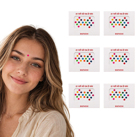A woman with long brown hair wearing a beige blouse and a red bindi, perfect for Indian wedding favors