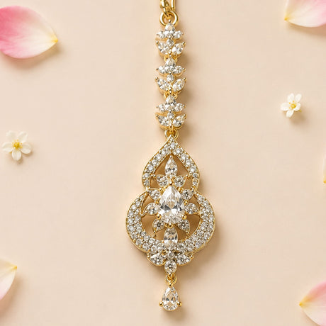 Gold-plated 1 ct small American diamond maang tikka with pear-shaped crystal and intricate floral design for Indian jewelry