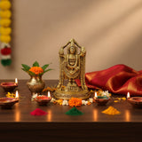 Golden deity statue with intricate carvings and floral decorations for Tirupati Balaji decor