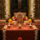 Golden brass Balaji and Venkateswara idol statue with intricate details and red drapery for decor