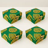 Four green and gold paisley brocade fabric gift boxes with gota patti work and golden clasps for weddings and celebrations