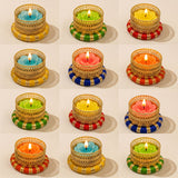 Colorful floral-shaped tealight candles in gold filigree holders with striped bases for festive home decor occasions