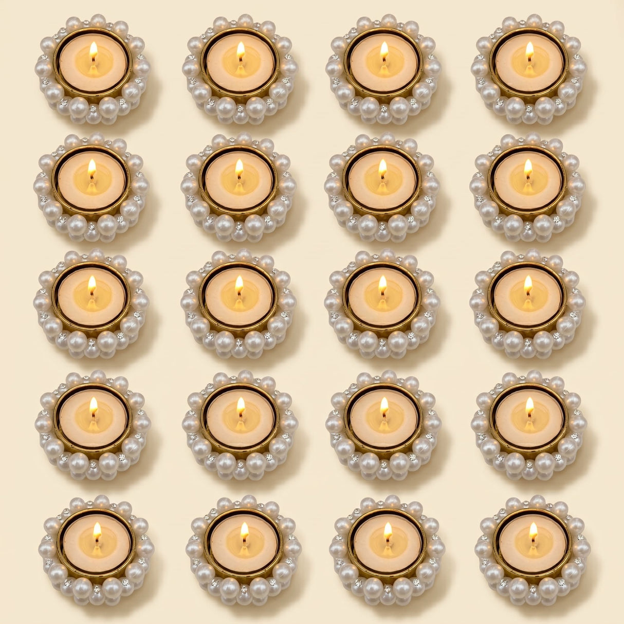 Bulk small pearl-encrusted gold tealight candle holders with lit candles for festive home decor and dining table centerpiece