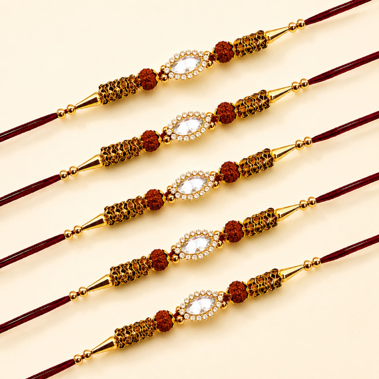 Five maroon designer stone rakhi bracelets with clear gemstones diamonds and rudraksha beads for raksha bandhan