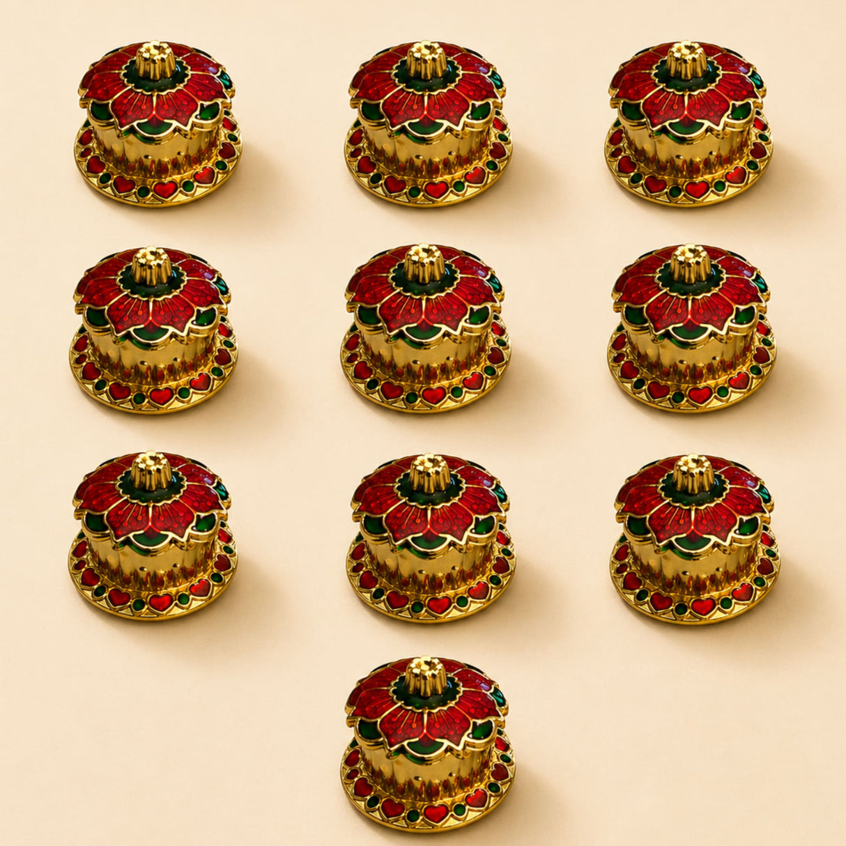 Golden incense burner with red and green enamel floral design traditional floral red haldi kumkum holder for pooja