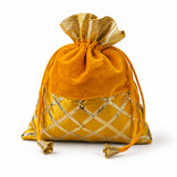Traditional Indian velvet potli bag in golden-orange with gota patti work and gold lattice embroidery for festive use