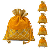 Traditional Indian velvet potli bag in golden with gota patti work velvet top and gold lattice drawstring pouch tassels