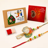 A colorful traditional floral pearl rakhi with rainbow beads and golden metallic finish for raksha bandhan gift set