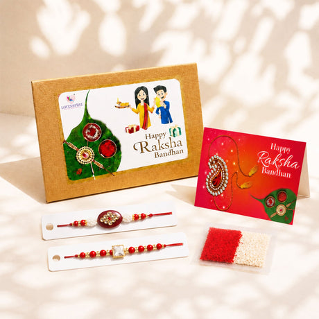 Traditional lumba rakhi set featuring red and gold embellished rakhi with central decorative pendant for raksha bandhan gift