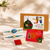 Traditional lumba rakhi set featuring a blue and turquoise beaded bracelet with a central blue oval pearl pendant
