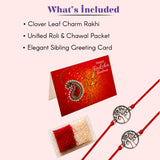 Silver clover leaf charm rakhi with red thread featuring intricate tree of life design for traditional raksha bandhan gift