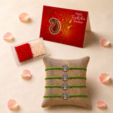 Set of four green cord tree of life charm rakhi bracelets displayed on burlap pillow for brother and bhabhi gift