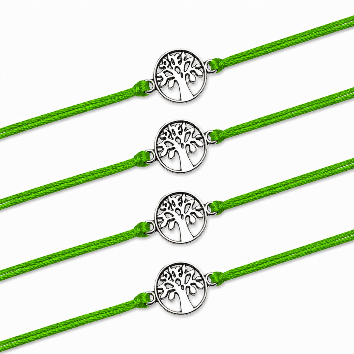 Four bright green cord tree of life charm rakhis with silver toned intricate cut out design for brother and bhabhi