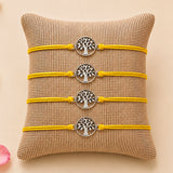 Four bright yellow cord rakhi bracelets with silver-toned tree of life charms for brother and bhabhi protection gift