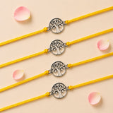 Four silver tree of life charm bracelets on vibrant yellow cords for traditional raksha bandhan gifts of protection and luck