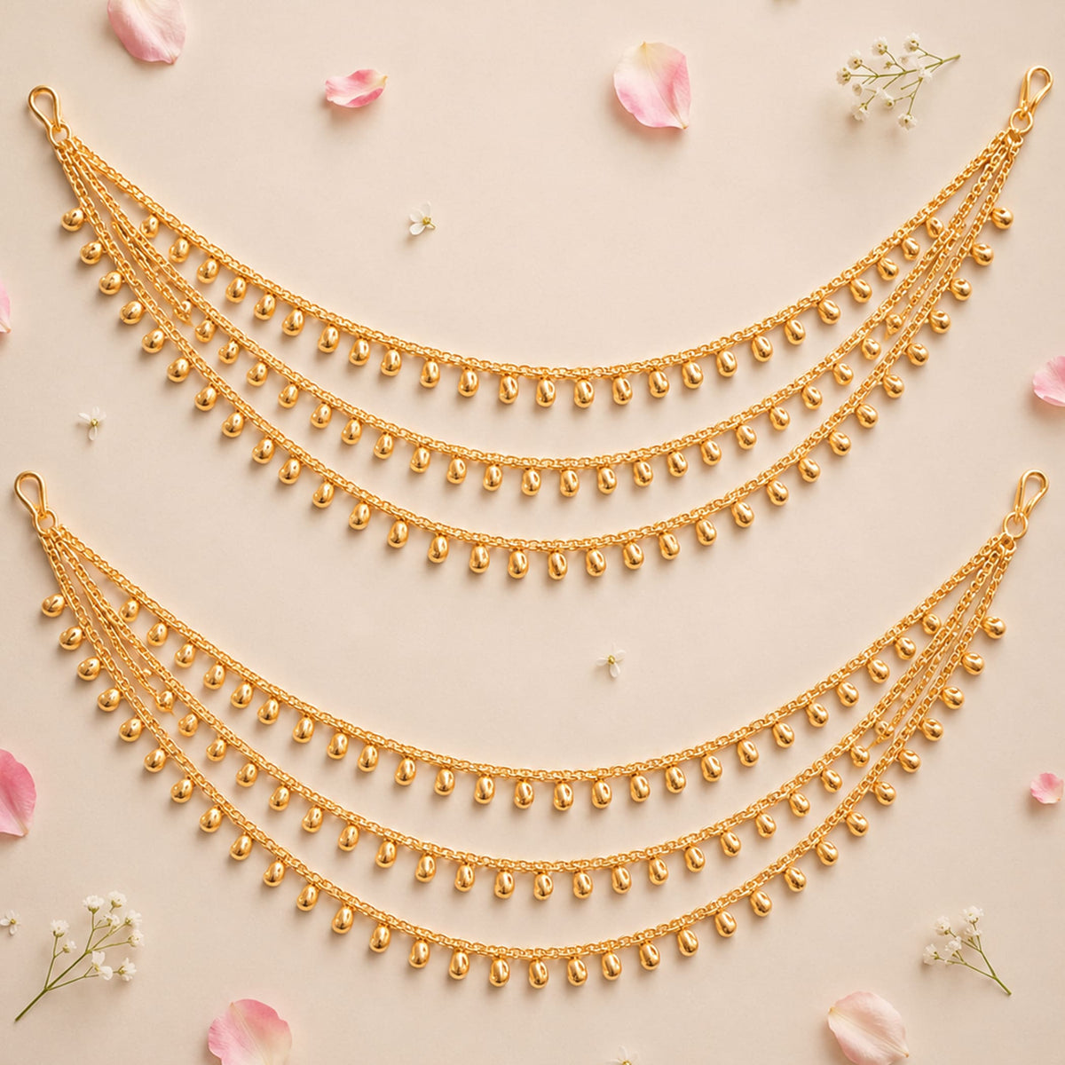 Gold plated triple layer ear chains with delicate teardrop beads and chain links indian traditional jewelry for women