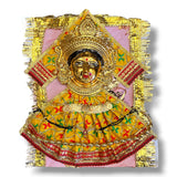 Ornate golden Hindu goddess face figure for Vara Lakshmi Vratam Navaratri puja