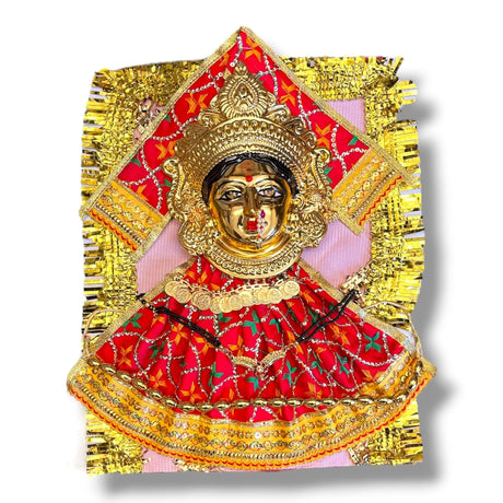 Golden-faced Hindu deity with red and gold patterned clothing for Vara Lakshmi idol