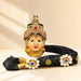 Vara Lakshmi goddess face set with black headpiece, gold embellishments, white flowers, blue gemstones for Navaratri pooja