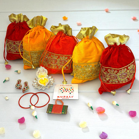 Colorful velvet gift bags with gold trim for Navaratri Vratham and Hindu rituals