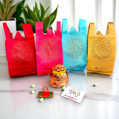 Colorful gift bags with intricate mandala design for Hindu religious ceremonies