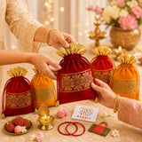 Red velvet drawstring potli bag with gold embroidery and golden flared top for varalakshmi vratham gift hamper
