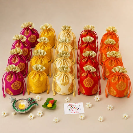 Vibrant embroidered drawstring pouches in pink yellow red and orange with gold paisley for Varalakshmi Vratham gift hamper