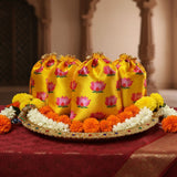 Yellow lotus drawstring pouches on floral mat for Varalakshmi Vratham gifts